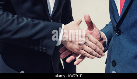 two businessman handshaking process Stock Photo
