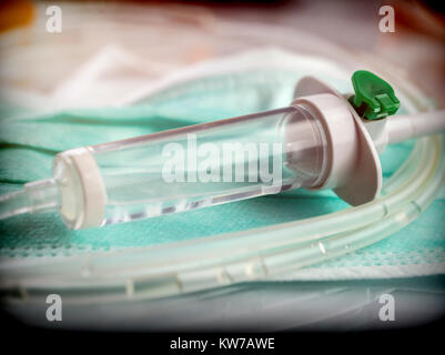 Detail of rubbers of a drip irrigation equipment in hospital operations table, conceptual image Stock Photo