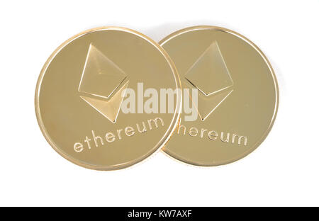 Two Real coin of cryptocurrency golden Ethereum isolated on white background Stock Photo