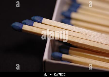 Extra Long blue Headed Household Matches. Macro Close Up, Exeter, Devon, UK. December, 2017. Stock Photo