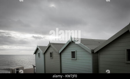 Beach Huts on Charmouth seafront Stock Photo