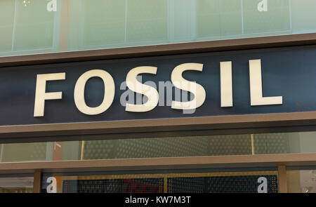 Fossil Boutique logo sign store Inc American designer manufacturer