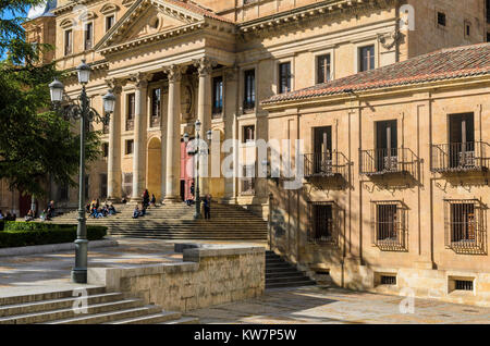 Students sitting on Anaya College steps in Plaza Anaya, Salamanca, Castile and Leon, Spain Stock Photo
