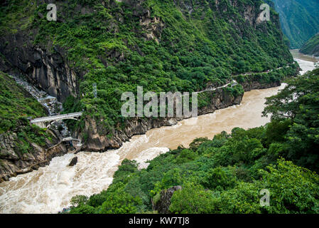 Tiger leaping gorge is a gorge formed by river Jinsha, the upper reach of the Yangtse river. It is a part of famous World Heritage Site Three Parallel Stock Photo