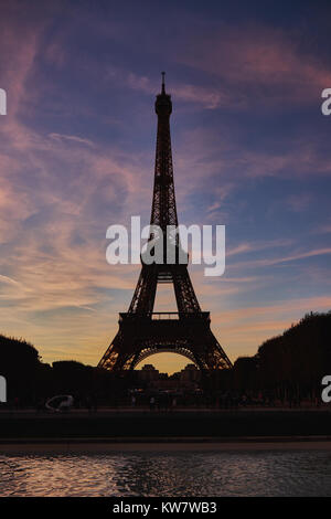 Eiffel tower in evening time at autumn .