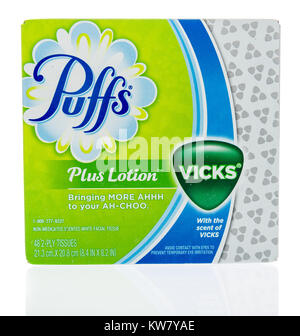 Winneconne, WI - 14 December 2017: A box of Puff's plus lotion with Vicks on an isolated background. Stock Photo