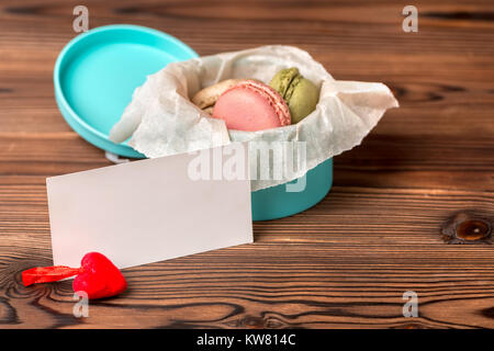 macarons cake in gift box, red heart and empty blank, St. Valentines day concept Stock Photo