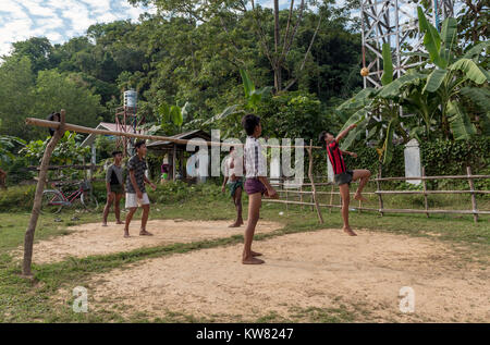 Villagers play a game of Sepak Takraw in Mrauk U, Burma (Myanmar) Stock Photo