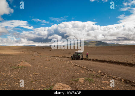 Jeep Wrangler Unlimited on a secluded gravel road in Iceland Stock Photo