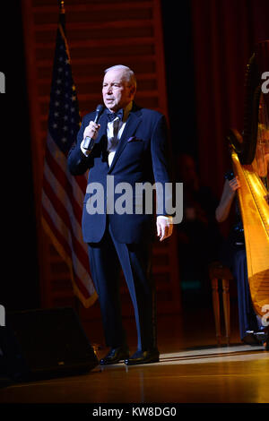 COCONUT CREEK, FL - JULY 12: Singer Frank Sinatra, Jr performs at Seminole Casino Coconut Creek. Franklin Wayne Sinatra (born January 10, 1944),  professionally known as Frank Sinatra, Jr., is an American singer, songwriter and conductor. Frank Jr. is the son of legendary musician and actor Frank Sinatra (born 'Francis') and Nancy Barbato Sinatra, his first wife. He is the younger brother of singer and actress Nancy Sinatra, and the older brother of television producer Tina Sinatra. In 1963, at the age of 19, Sinatra was kidnapped and released two days later after payment of a ransom on July 1 Stock Photo