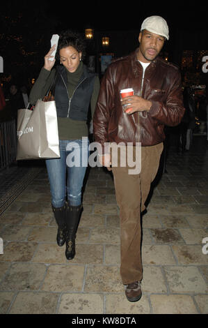 LOS ANGELES, CA - NOVEMBER 23: Michael Strahand and Nicole Murphy, (Eddie Murphy's former wife of 12 years and mother of five of his children),  go Christmas shopping in the Grove. On December 23, 2008 in Los Angeles. California.  People:  Nicole Murphy, Michael Strahand Stock Photo