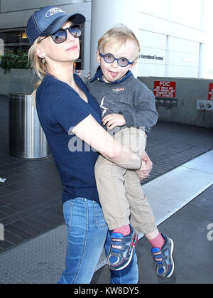 LOS ANGELES, CA - APRIL 21: Anna Faris and son Jack is seen at LAX on April 21, 2016 in Los Angeles, California  People:  Anna Faris and son Jack