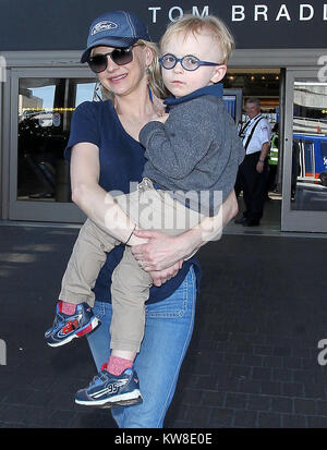 LOS ANGELES, CA - APRIL 21: Anna Faris and son Jack is seen at LAX on April 21, 2016 in Los Angeles, California  People:  Anna Faris and son Jack