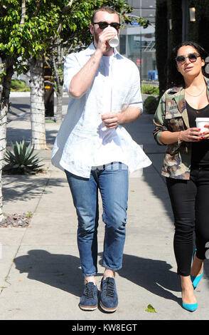 LOS ANGELES, CA - APRIL 25: Singer Sam Smith gets coffee with an unidentified woman. Samuel Frederick 'Sam' Smith is an English singer-songwriter. He rose to fame in October 2012 when he was featured on Disclosure's breakthrough single 'Latch', which peaked at number eleven on the UK Singles Chart on April 25, 2016 in west Hollywood, California  People:  Sam Smith Stock Photo