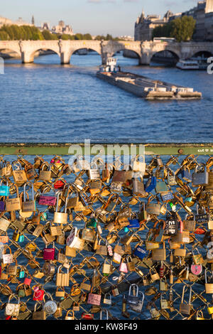 France, Paris (75), locks of lovers on fence at edge on Pont des Arts Stock Photo