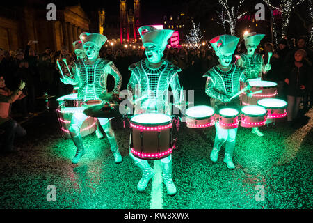 Edinburgh, Scotland, United Kingdom. 31 December 2017. Spark! LED Drummers perform on Princes Street during Drum Off with all female drumming group during annual New Year of Hogmanay celebrations in the city. Stock Photo