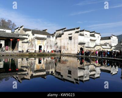 Huangshan, China's Anhui Province. 1st Jan, 2018. Tourists visit Hongcun, an ancient village in Yixian County of Huangshan City, east China's Anhui Province, Jan. 1, 2018. Credit: Pan Cheng/Xinhua/Alamy Live News Stock Photo