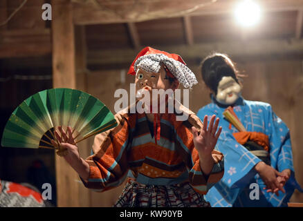 Tokorozawa, Japan. 1st Jan, 2018. At the stroke of midnight, hundreds of citizens descend on a local shrine to offer their first prayers of the New Year in Tokorozawa, Tokyos western suburbs on Monday, January 1, 2018. Throughout the country, millions of Japanese visit nearby shrines and temples, some offering the New Years first prayers while the other making first wishes in the centuries-old practice. Credit: Natsuki Sakai/AFLO/Alamy Live News Stock Photo