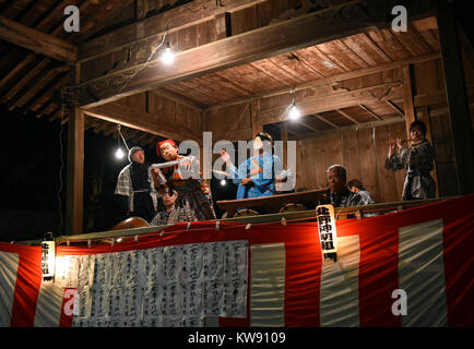 Tokorozawa, Japan. 1st Jan, 2018. At the stroke of midnight, hundreds of citizens descend on a local shrine to offer their first prayers of the New Year in Tokorozawa, Tokyos western suburbs on Monday, January 1, 2018. Throughout the country, millions of Japanese visit nearby shrines and temples, some offering the New Years first prayers while the other making first wishes in the centuries-old practice. Credit: Natsuki Sakai/AFLO/Alamy Live News Stock Photo