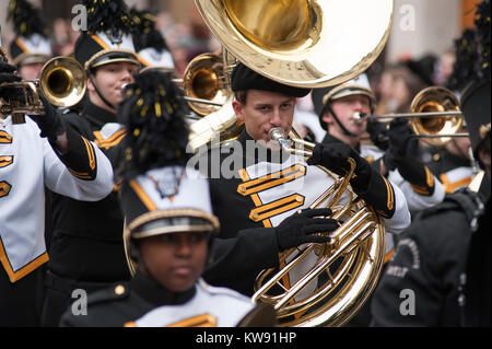 Central London, UK. 1st Jan, 2018. London's spectacular New Year's Day Parade starts at 12 noon in Piccadilly, making it's way down famous West End thoroughfares, finishing in Parliament Square at 3.00pm. Shawnee Mission West Pride Marching Band from Kansas USA. Credit: Malcolm Park/Alamy Live News. Stock Photo
