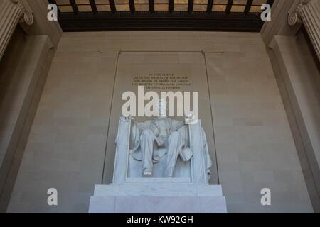 Close up interior shot of marble statue of Abraham Lincoln sitting contemplating in the Lincoln Memorial, Washington DC, USA Stock Photo