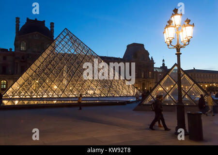 The Louvre Pyramid just after sunset, Paris, France Stock Photo