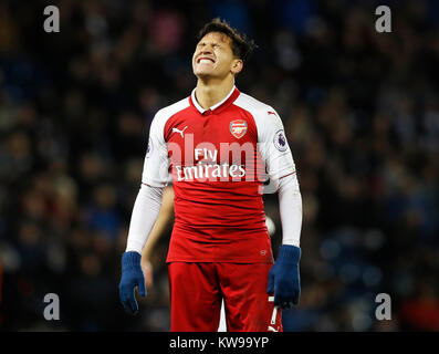 Arsenal's Alexis Sanchez looks dejected during the Premier League match at The Hawthorns, West Bromwich. Stock Photo