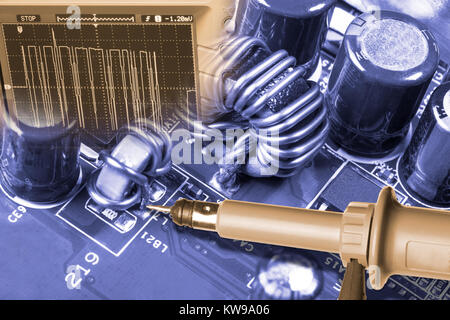 Detail of computer hardware. Repair of mainboard. Concept of measurement using digital oscilloscope. Stock Photo