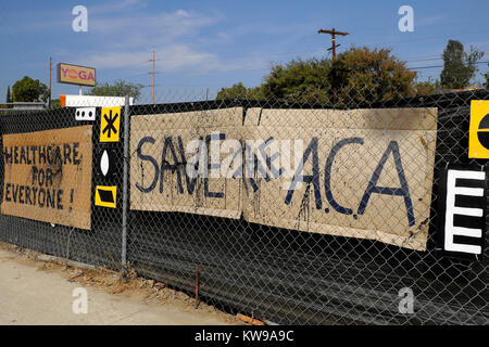 Pro American Healthcare plan Save the ACA poster on a roadside fence in Silver Lake neighborhood of Los Angeles, California USA  2017   KATHY DEWITT Stock Photo