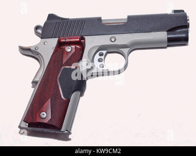 A multi-colored 1911 pistol on a white background Stock Photo