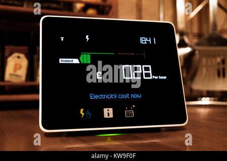 chameleon technology smart meter, the display shows the cost of energy being used in a home. Stock Photo