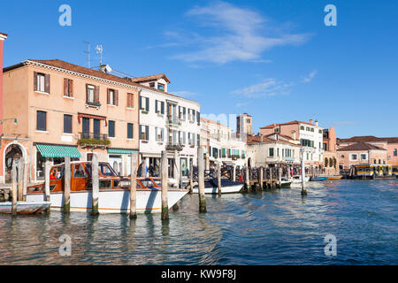 Murano Island, Venice, Italy, view along Riva Longa and thwe waterfront  from the canal on a sunny winter day Stock Photo
