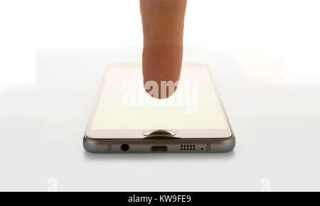 finger tips on home button of smart phone, isolated on white background Stock Photo