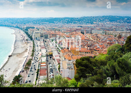 Nice, Cote d'Azur, France - May 10, 2010: Aerial view above the city of Nice from Parc du Chateau looking along the Promenade des Anglais coastline Stock Photo