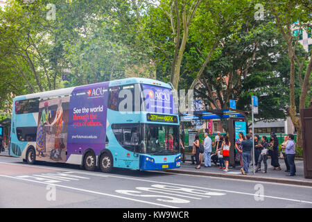 Double decker bus stops in York street at Wynyard bus stop  in Sydney city centre,Australia Stock Photo