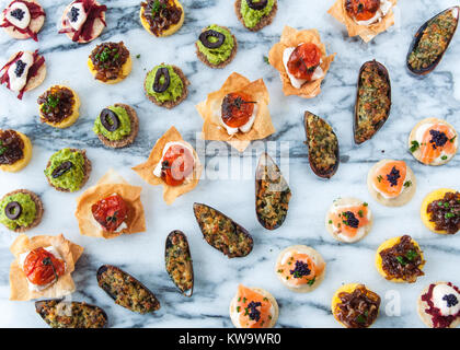 canapes in 8 rows on grey vein marble aerial Stock Photo