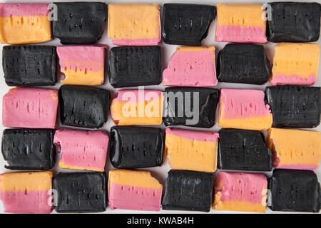 Fruit Salad and blackjack candy chews in a pattern Stock Photo