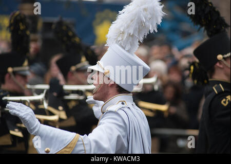 Central London, UK. 1st Jan, 2018. London's spectacular New Year's Day Parade starts at 12 noon in Piccadilly, making it's way down famous West End thoroughfares, finishing in Parliament Square at 3.00pm. Corning Painted Post Hawks Marching Band from New York USA. Credit: Malcolm Park/Alamy Live News. Stock Photo