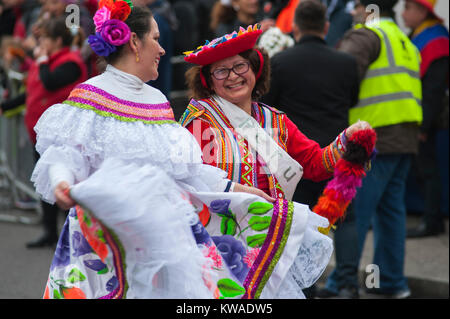 Central London, UK. 1st Jan, 2018. London's spectacular New Year's Day Parade starts at 12 noon in Piccadilly, making it's way down famous West End thoroughfares, finishing in Parliament Square at 3.00pm. Colourful south American costumes including Fraternidad Cultural Bolivia UK, Venezuela, Peru and Mexico. Credit: Malcolm Park/Alamy Live News. Stock Photo