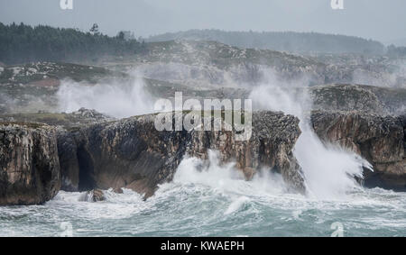 Llanes, Spain. 01st Jan, 2018. Waves crashing against the cliffs of 'Bufones of Pria' on January 01, 2018 in Llanes, Spain. 'Carmen' storm has arrived from the Atlantic to Spain bringing strong winds, rains and snowfalls to almost all the country. Asturias has registred gusts of winds reaching 100 km per hour. Credit: David Gato/Alamy Live News Stock Photo