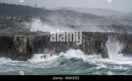 Llanes, Spain. 01st Jan, 2018. Waves crashing against the cliffs of 'Bufones of Pria' on January 01, 2018 in Llanes, Spain. 'Carmen' storm has arrived from the Atlantic to Spain bringing strong winds, rains and snowfalls to almost all the country. Asturias has registred gusts of winds reaching 100 km per hour. Credit: David Gato/Alamy Live News Stock Photo