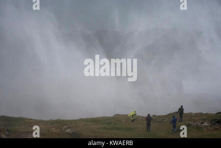 Llanes, Spain. 01st Jan, 2018. Sea water is expelled ashore at geysers of 'Bufones of Pria' on January 01, 2018 in Llanes, Spain. 'Carmen' storm has arrived from the Atlantic to Spain bringing strong winds, rains and snowfalls to almost all the country. Asturias has registred gusts of winds reaching 100 km per hour. Credit: David Gato/Alamy Live News Stock Photo