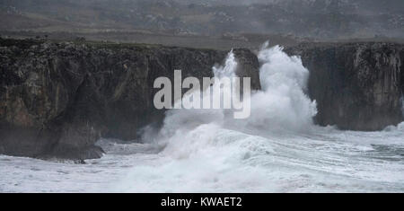 Llanes, Spain. 01st Jan, 2018. Waves crashing against the cliffs of 'Bufones of Pria' on January 01, 2018 in Llanes, Spain. 'Carmen' storm has arrived from the Atlantic to Spain bringing strong winds, rains and snowfalls to almost all the country. Asturias has registred gusts of winds reaching 100 km per hour. Credit: David Gato/Alamy Live News Stock Photo