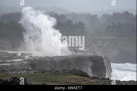 Llanes, Spain. 01st Jan, 2018. Sea water is expelled ashore at geysers of 'Bufones of Pria' on January 01, 2018 in Llanes, Spain. 'Carmen' storm has arrived from the Atlantic to Spain bringing strong winds, rains and snowfalls to almost all the country. Asturias has registred gusts of winds reaching 100 km per hour. Credit: David Gato/Alamy Live News Stock Photo