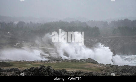 Llanes, Spain. 01st Jan, 2018. Waves crashing against the cliffs of 'Bufones of Pria' on January 01, 2018 in Llanes, Spain. 'Carmen' storm has arrived from the Atlantic to Spain bringing strong winds, rains and snowfalls to almost all the country. Asturias has registred gusts of winds reaching 100 km per hour. Credit: David Gato/Alamy Live News Stock Photo