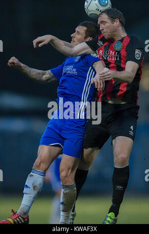Halifax, UK. 01st Jan, 2018. Keith Lowe (Macclesfield Town) wins the header during FC Halifax Town v Macclesfield in the Vanarama National League game on Monday 1 January 2018 at The MBI Shay Stadium, Halifax, West Yorkshire. Photo by Mark P Doherty. Credit: Caught Light Photography Limited/Alamy Live News Stock Photo