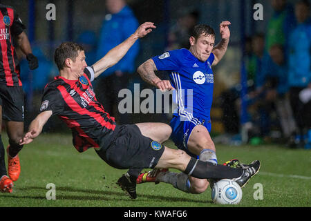 Halifax, UK. 01st Jan, 2018. Ben Tomlinson (FC Halifax Town) is tackled by George Pilkington (Macclesfield Town) during FC Halifax Town v Macclesfield in the Vanarama National League game on Monday 1 January 2018 at The MBI Shay Stadium, Halifax, West Yorkshire. Photo by Mark P Doherty. Credit: Caught Light Photography Limited/Alamy Live News Stock Photo