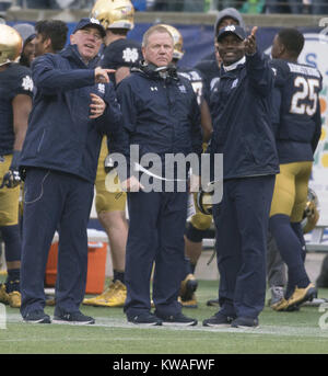 Orlando, Florida, USA. 1st January, 2018. Notre Dame head coach BRIAN KELLY and his coaches look at the scoreboard during a officials review during the second half of the Florida Citrus Bowl at Camping World Stadium. Credit: Jerome Hicks/ZUMA Wire/Alamy Live News Stock Photo