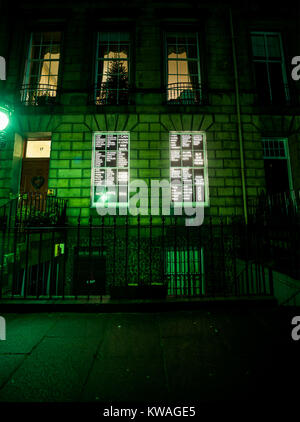 Edinburgh, UK. 01st Jan, 2018. The opening night of “Message from the Skies”, a literary journey through the city of Edinburgh. It features a new story, “New Year's Resurrection”, by leading Scottish writer Val McDermid told through projections onto Edinburgh's buildings and landmarks with readers guided by a smart phone application. This projection takes place at 17 Heriot Row. Credit: Andy Catlin/Alamy Live News Stock Photo