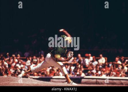 An Oakland A's player pitches during a game with the Chicago Cubs at Wrigley Field, Chicago, Illinois, July, 1973. Image courtesy National Archives. Stock Photo